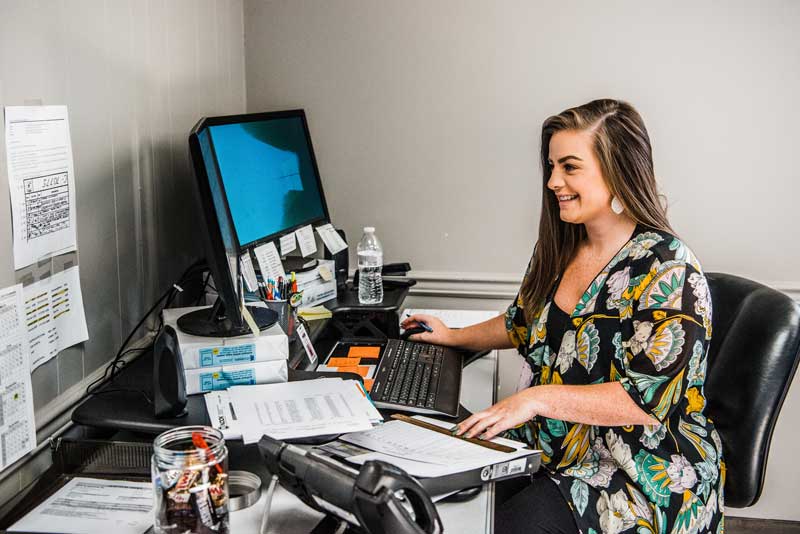 woman working in Buck company office.jog